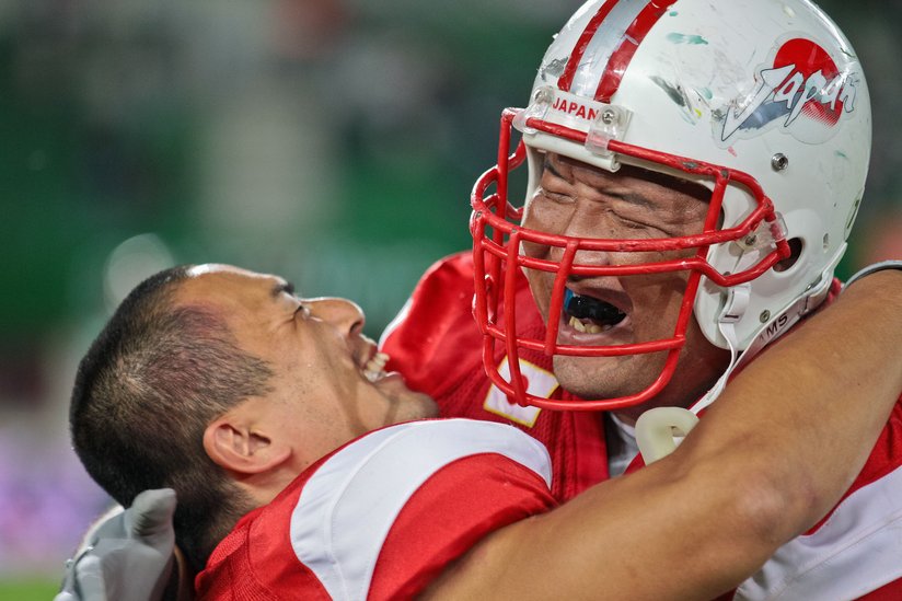 Image result for american football hug